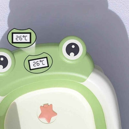 baignoire-pliable-pour-bebe-vert-blanc-compacte-pratique-design-enfantin-fonctionnel-etreinte-d-ocean
