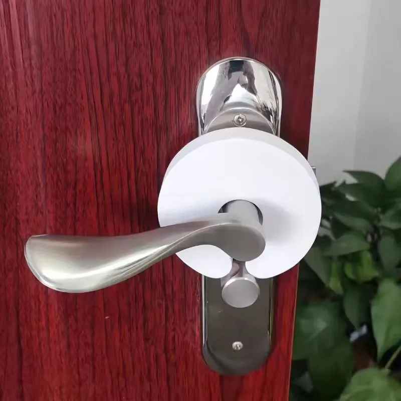 bloque-porte-couleur-blanche-fixe-sur-poignee-porte-anti-pince-doigts