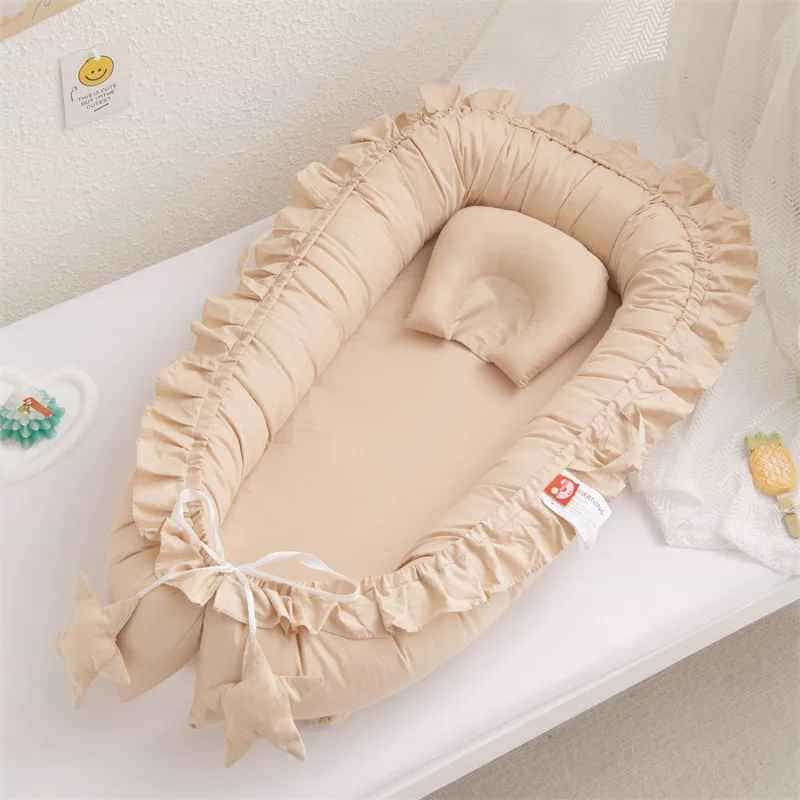 reducteur-de-lit-bebe-couleur-beige-avec-oreille-calinid