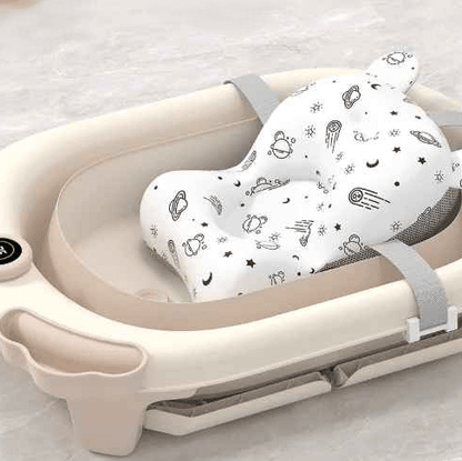 baignoire-pliable-pour-bebe-beige-coussin-etoiles-meduses-vue-dessus-serenite-bleutee