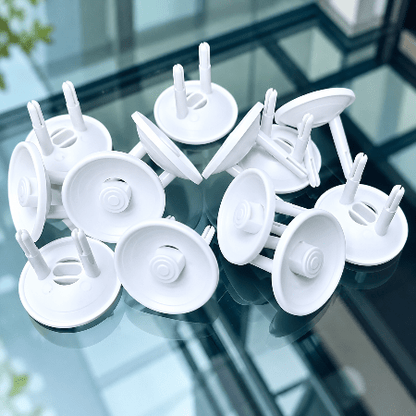 cache-prise-pour-bebe-lot-multiple-caches-blancs-reflets-securi-plug-calme