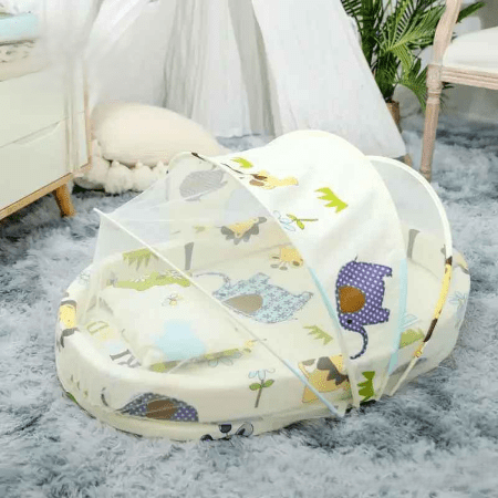 reducteur-de-lit-6-12-mois-avec-motif-jungle-beige-doux-cocon-douillet