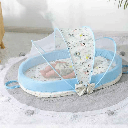 reducteur-de-lit-6-12-mois-bebe-allonge-motif-bleu-cocon-douillet