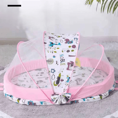 reducteur-de-lit-6-12-mois-motif-animaux-rose-noble-cocon-douillet