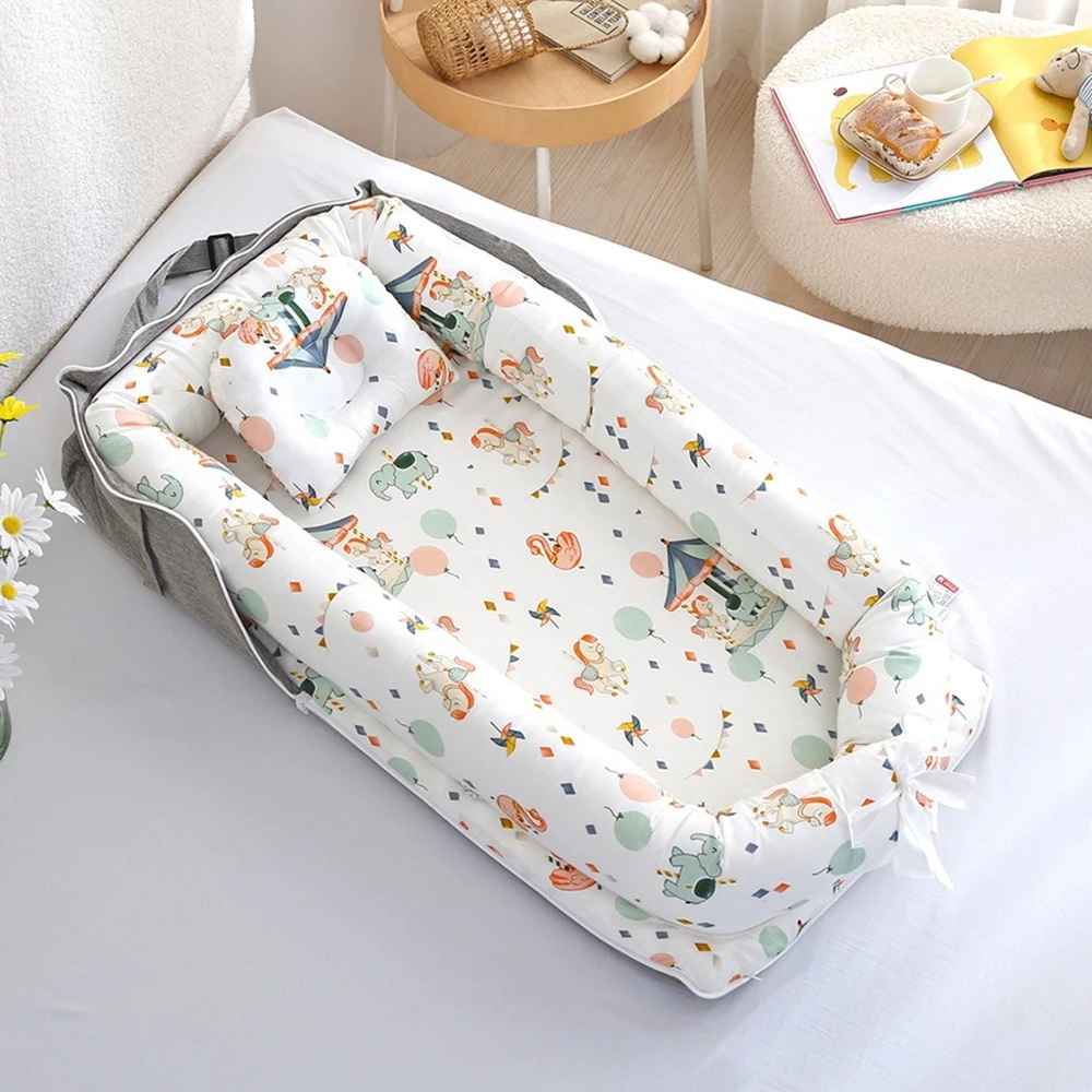 reducteur-de-lit-6-12-mois-pour-bebe-nid-imprime-couleurs-douces-confort-securite-nid-de-serenite