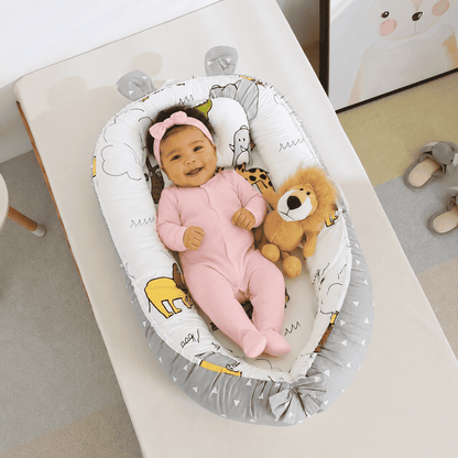 reducteur-de-lit-animaux-bebe-nid-confort-jouet-lion-design-colore-reve-serenite