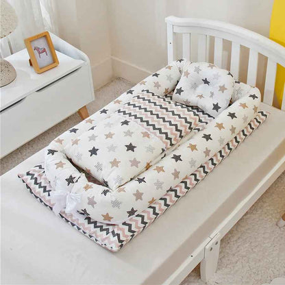 reducteur-de-lit-babymoov-etoiles-zigzag-dans-berceau-chambre-douce-eveil-tranquille