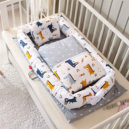 reducteur-de-lit-babymoov-nid-bebe-imprime-animaux-couleurs-pastel-confort-eveil-tranquille