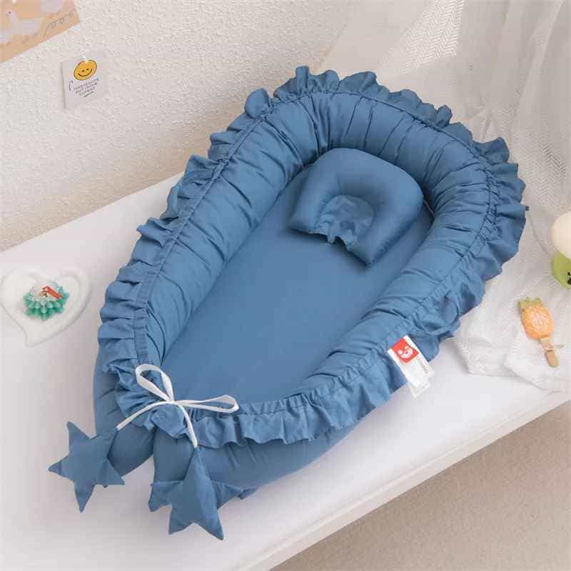 reducteur-de-lit-bebe-couleur-bleue-calinid
