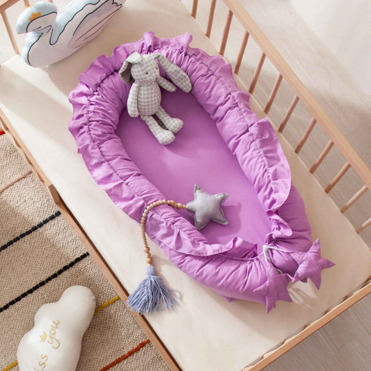 reducteur-de-lit-bebe-de-couleur-lavande-calmenid
