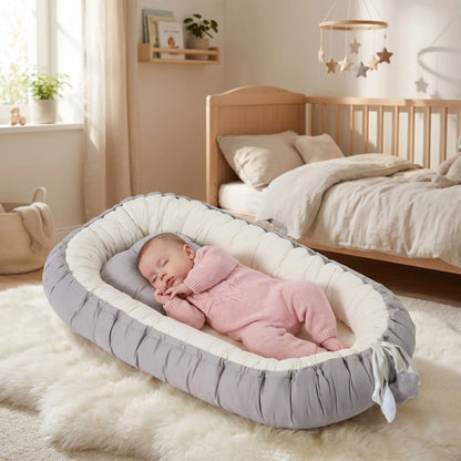 reducteur-de-lit-bebe-sommeil-douillet-nid-confort-rose-chambre-cocooning-berceau-tranquille