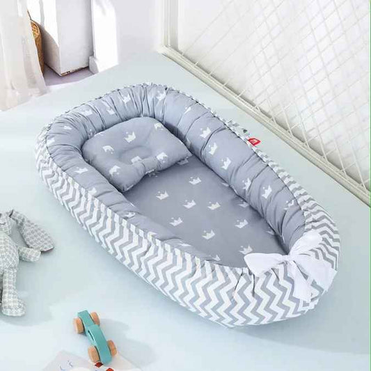 reducteur-de-lit-gris-avec-couronne-lecocon
