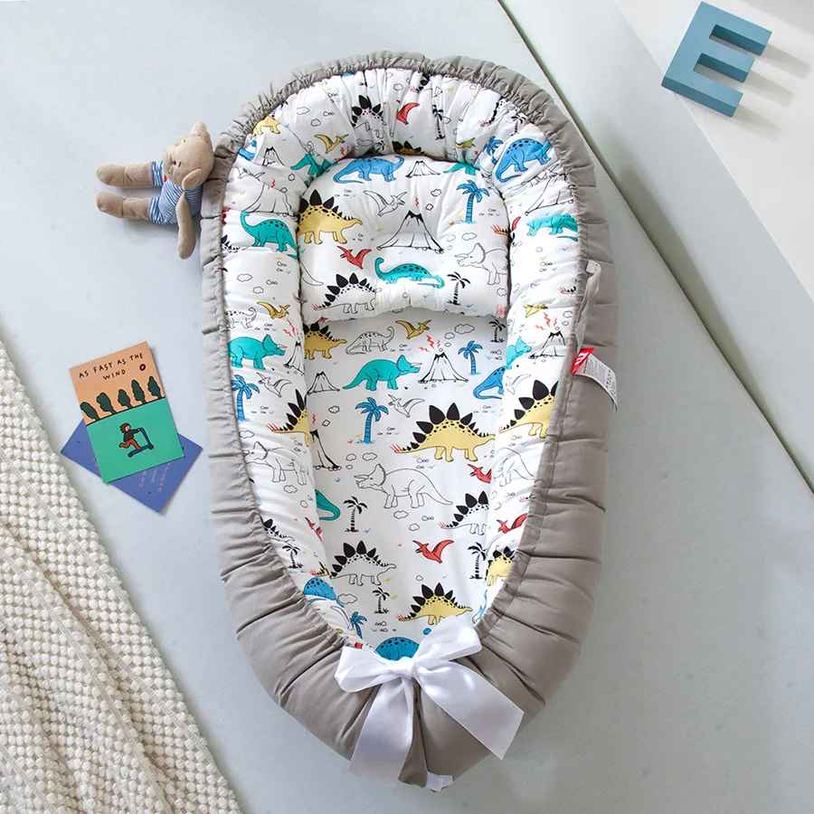 reducteur-de-lit-gris-fond-blanc-dessins
-animaux-doudinid