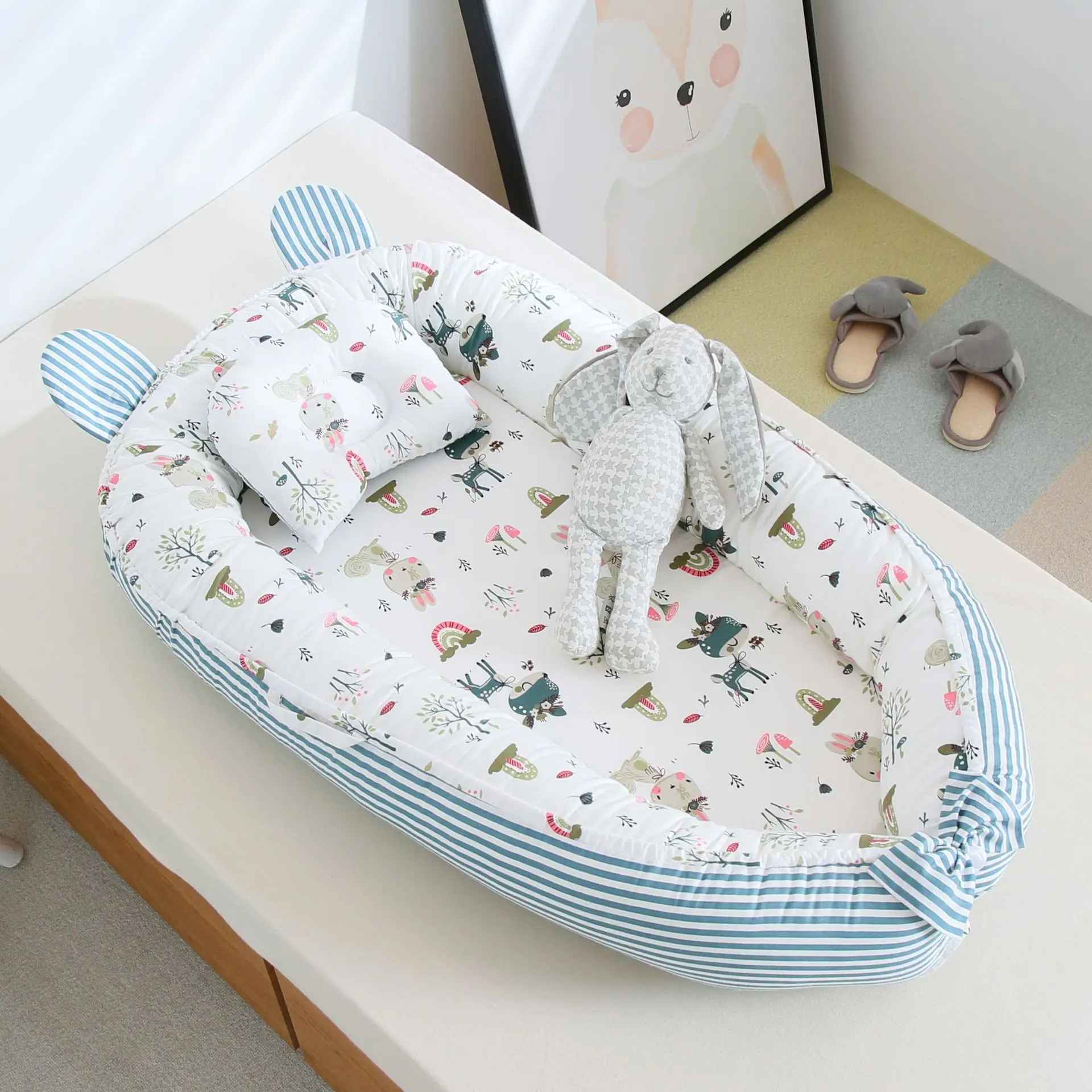 reducteur-de-lit-nid-bebe-animaux-foret-coussin-peluche-decoration-chambre-enfant-nuage-calme
