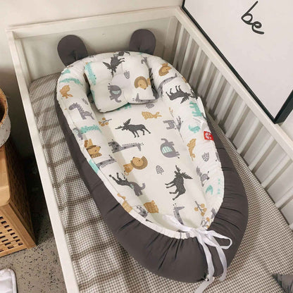 reducteur-de-lit-nid-bebe-animaux-gris-coussin-confort-berceau-chambre-enfant-brume-de-repos