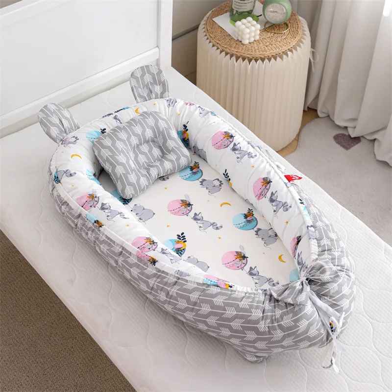 reducteur-de-lit-nid-bebe-gris-motif-animaux-coussin-peluche-accessoires-chambre-enfant-reve-apaisant