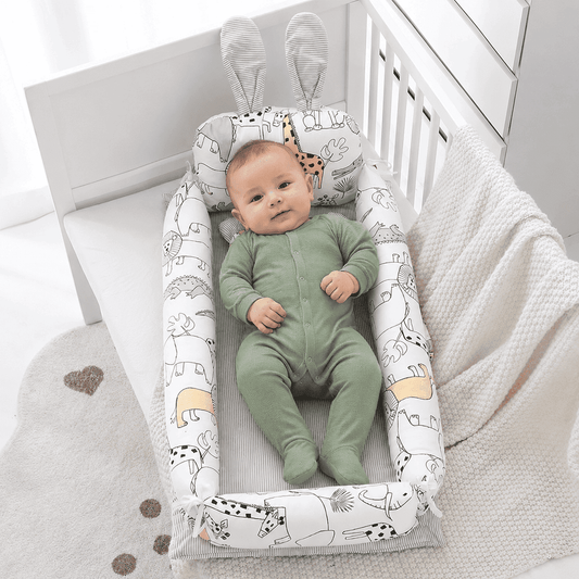 reducteur-de-lit-tineo-bebe-allonge-confort-nid-imprime-animaux-chambre-douce-protection