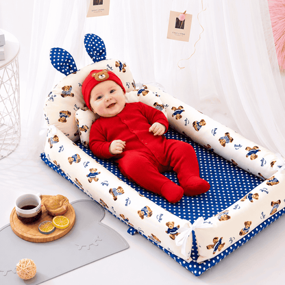 reducteur-de-lit-tineo-bebe-rouge-nid-bleu-oursons-confort-douce-ambiance-nurserie-douce-protection