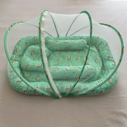 reducteur-de-lit-vert-baudet-motif-arc-en-ciel-flocon-de-paix