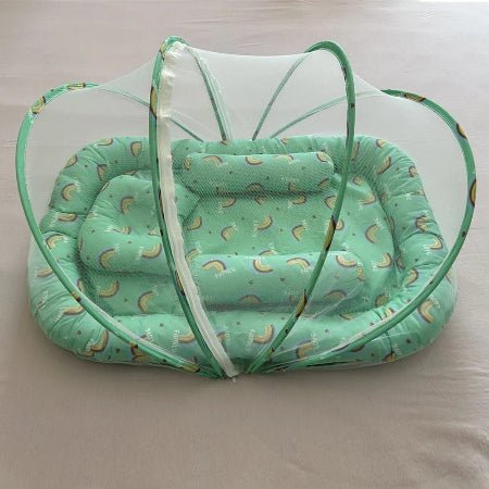 reducteur-de-lit-vert-baudet-motif-arc-en-ciel-flocon-de-paix