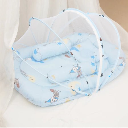 reducteur-de-lit-vert-baudet-motif-lune-etoiles-bleu-flocon-de-paix