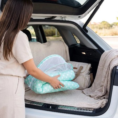 reducteur-de-lit-vert-baudet-plie-range-coffre-voiture-flocon-de-paix