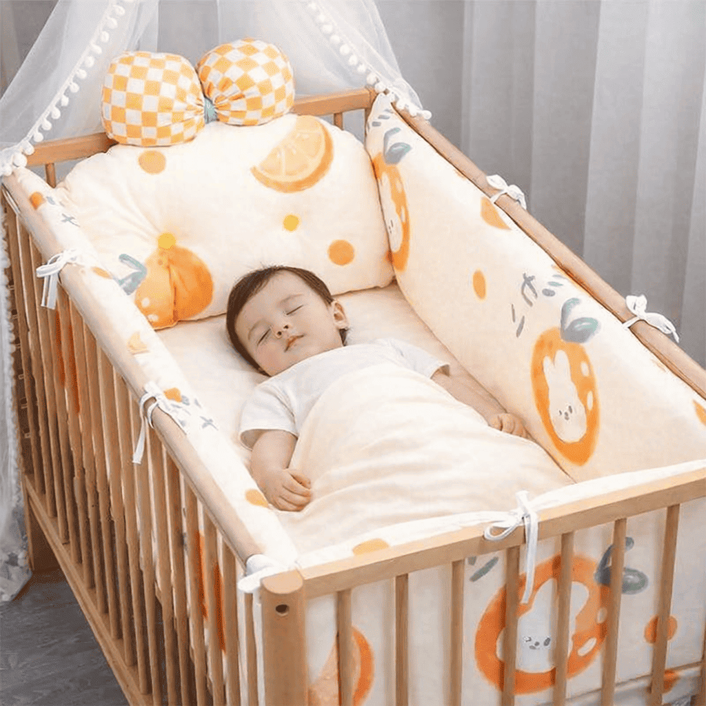 tour-de-lit-bebe-orange-douillet-matelasse-fruits-chambre-nouveau-ne-confort-ecrin-protecteur