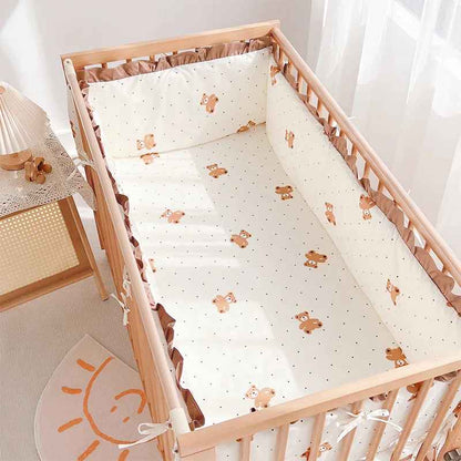 tour-de-lit-motif-marron-fond-banc-cosibebe