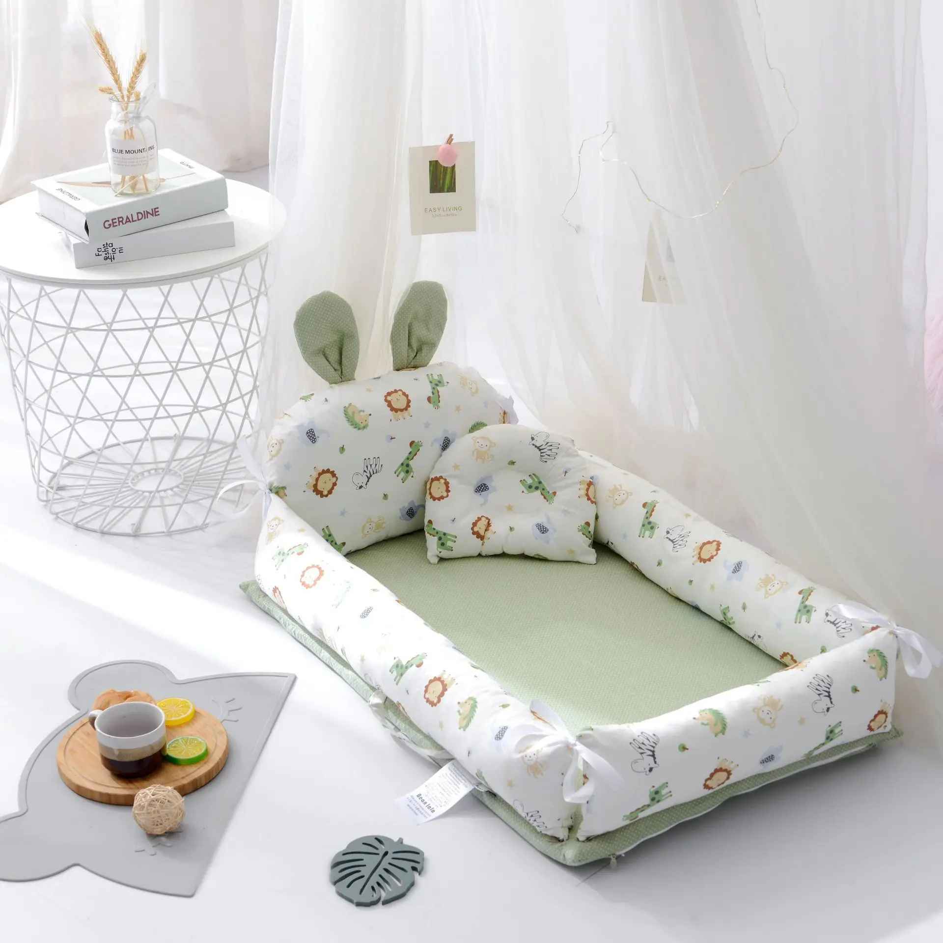vertbaudet-reducteur-de-lit-nid-bebe-vert-imprime-animaux-confort-nursery-douceur-cocon-precieux-nuit